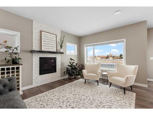 95 Vancouver Crescent, Red Deer, AB - Indoor Photo Showing Living Room With Fireplace