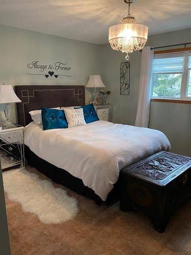 4616 48A Avenue, Sylvan Lake, AB - Indoor Photo Showing Bedroom