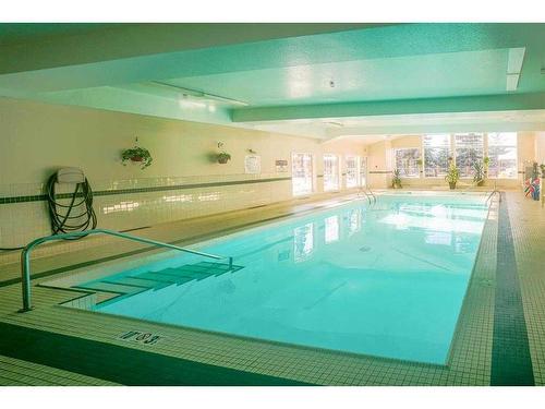 236-4512 52 Avenue, Red Deer, AB - Indoor Photo Showing Other Room With In Ground Pool