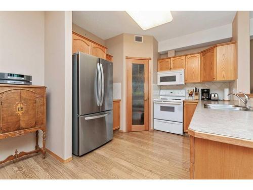 424-5300 48 Street, Red Deer, AB - Indoor Photo Showing Kitchen With Double Sink
