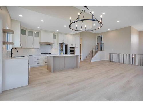 13 Songbird Green, Sylvan Lake, AB - Indoor Photo Showing Kitchen With Upgraded Kitchen