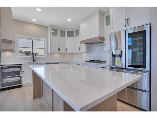 13 Songbird Green, Sylvan Lake, AB - Indoor Photo Showing Kitchen With Upgraded Kitchen