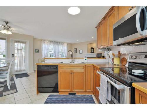 101 Old Boomer Road, Sylvan Lake, AB - Indoor Photo Showing Kitchen With Double Sink