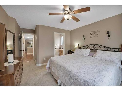 64 Jarvis Avenue, Red Deer, AB - Indoor Photo Showing Bedroom