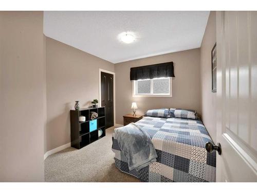 64 Jarvis Avenue, Red Deer, AB - Indoor Photo Showing Bedroom