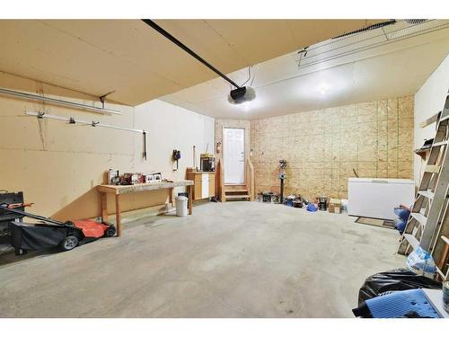 64 Jarvis Avenue, Red Deer, AB - Indoor Photo Showing Garage