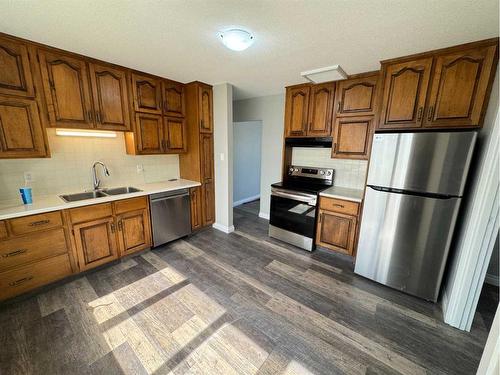 4110 37 Avenue, Red Deer, AB - Indoor Photo Showing Kitchen With Double Sink