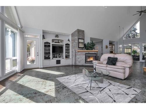 25558 Highway 39, Rural Leduc County, AB - Indoor Photo Showing Living Room With Fireplace