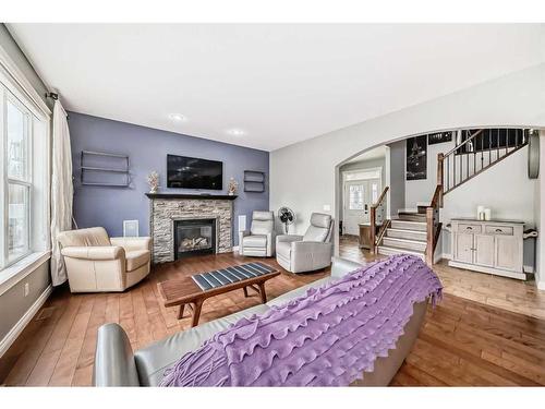 7206 61 Street, Rocky Mountain House, AB - Indoor Photo Showing Living Room With Fireplace