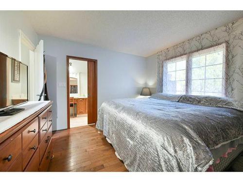 24027 Highway 595, Rural Red Deer County, AB - Indoor Photo Showing Bedroom