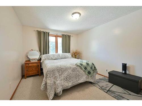 24027 Highway 595, Rural Red Deer County, AB - Indoor Photo Showing Bedroom