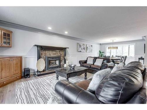 3526 Spruce Drive, Red Deer, AB - Indoor Photo Showing Living Room With Fireplace