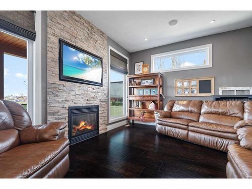 32 Connaught Crescent, Red Deer, AB - Indoor Photo Showing Living Room With Fireplace