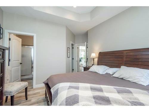 82 Mann Drive, Penhold, AB - Indoor Photo Showing Bedroom