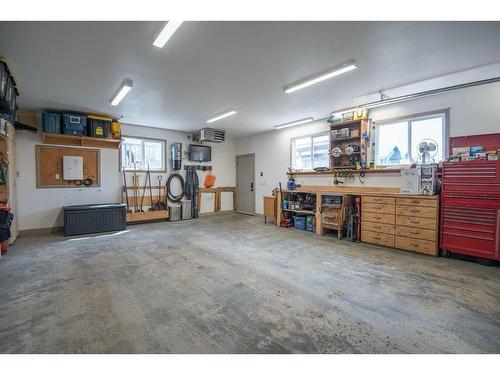 82 Mann Drive, Penhold, AB - Indoor Photo Showing Garage