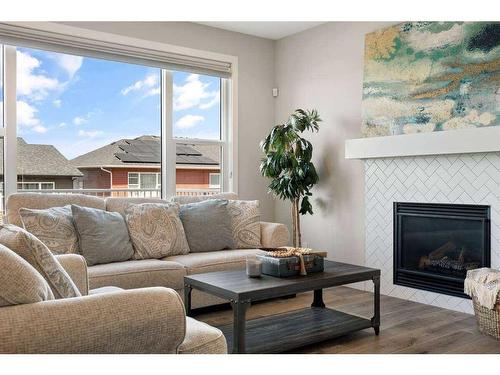 23 Crestbrook Link Sw, Calgary, AB - Indoor Photo Showing Living Room With Fireplace
