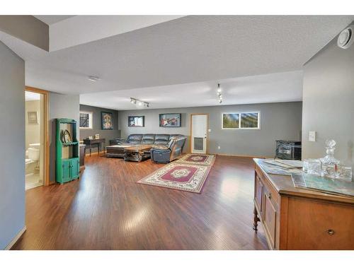 78 Westglen Boulevard, Blackfalds, AB - Indoor Photo Showing Other Room With Fireplace