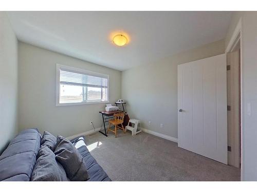 11 Crestview Boulevard, Sylvan Lake, AB - Indoor Photo Showing Bedroom