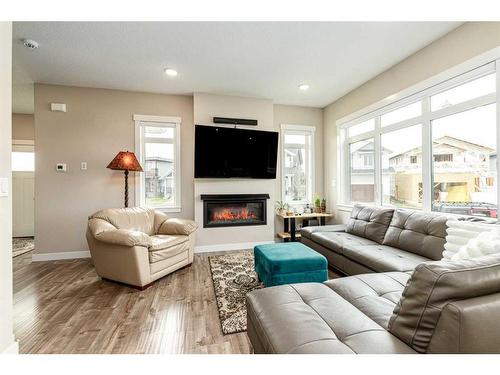 12 Eaton Crescent, Red Deer, AB - Indoor Photo Showing Living Room With Fireplace