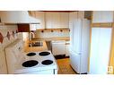 10760 31 Avenue Nw, Edmonton, AB  - Indoor Photo Showing Kitchen With Double Sink 