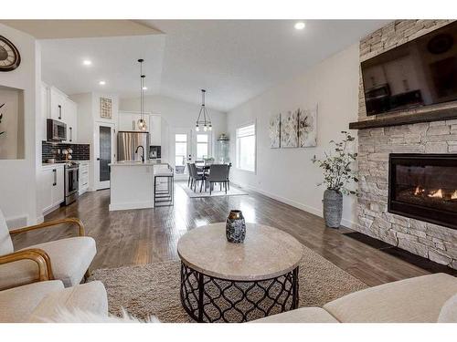 73 Longmire Close, Red Deer, AB - Indoor Photo Showing Living Room With Fireplace