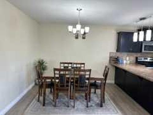 5252 48 Street Close South, Innisfail, AB - Indoor Photo Showing Dining Room