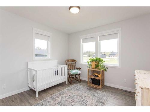 140-27111 Highway 597 Road, Rural Lacombe County, AB - Indoor Photo Showing Bedroom