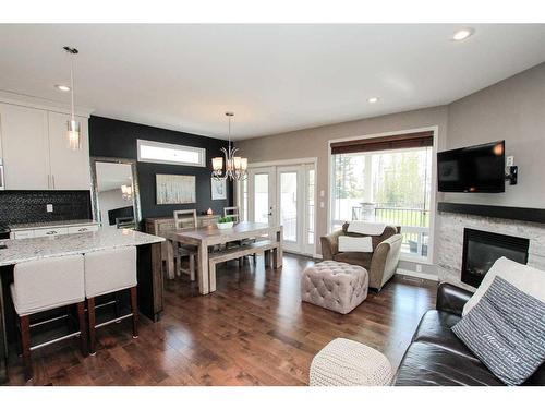 93 Connaught Crescent, Red Deer, AB - Indoor Photo Showing Living Room With Fireplace