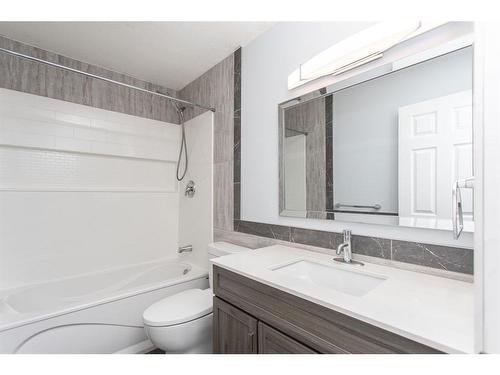 5103 49 Street, Clive, AB - Indoor Photo Showing Bathroom