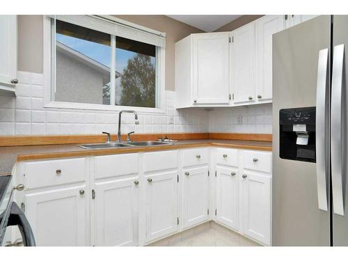 60 Boyce Street, Red Deer, AB - Indoor Photo Showing Kitchen With Double Sink