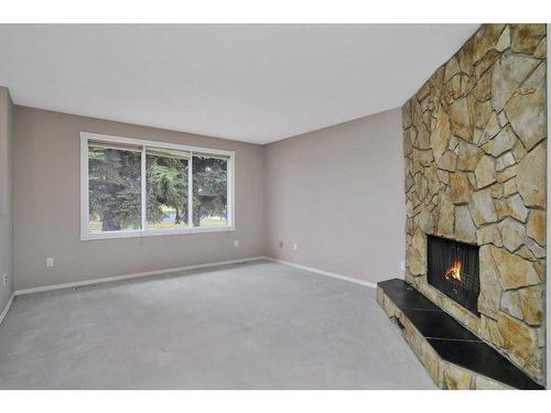 60 Boyce Street, Red Deer, AB - Indoor With Fireplace