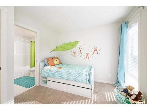 201 Vantage Drive, Cochrane, AB - Indoor Photo Showing Bedroom