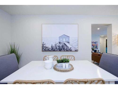201 Vantage Drive, Cochrane, AB - Indoor Photo Showing Dining Room