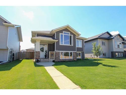 32 Iron Wolf Boulevard, Lacombe, AB - Outdoor With Facade