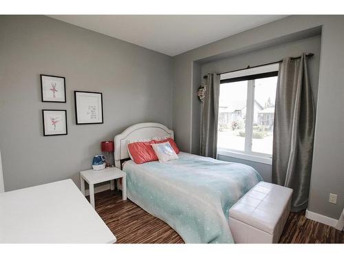 32 Iron Wolf Boulevard, Lacombe, AB - Indoor Photo Showing Bedroom