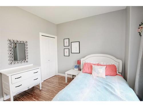 32 Iron Wolf Boulevard, Lacombe, AB - Indoor Photo Showing Bedroom