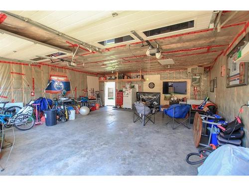 32 Iron Wolf Boulevard, Lacombe, AB - Indoor Photo Showing Garage