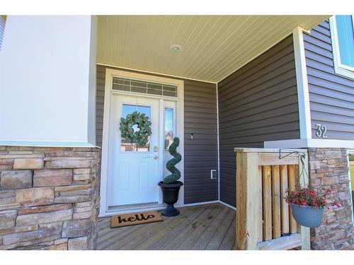 32 Iron Wolf Boulevard, Lacombe, AB - Outdoor With Deck Patio Veranda With Exterior