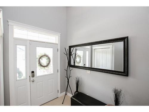 32 Iron Wolf Boulevard, Lacombe, AB - Indoor Photo Showing Other Room