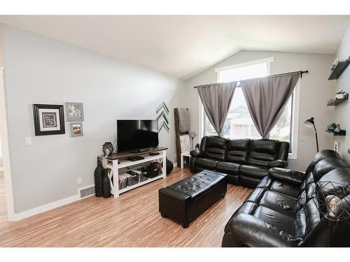 32 Iron Wolf Boulevard, Lacombe, AB - Indoor Photo Showing Living Room