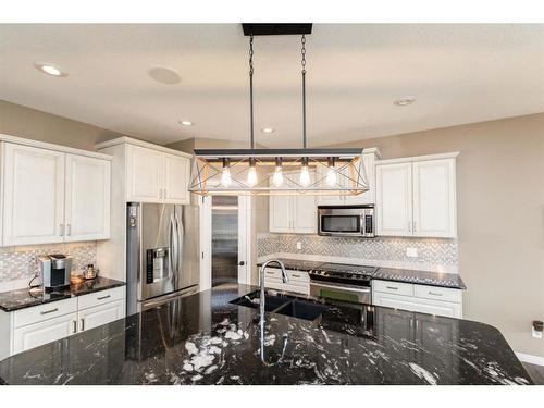 19 Voisin Close, Red Deer, AB - Indoor Photo Showing Kitchen With Upgraded Kitchen
