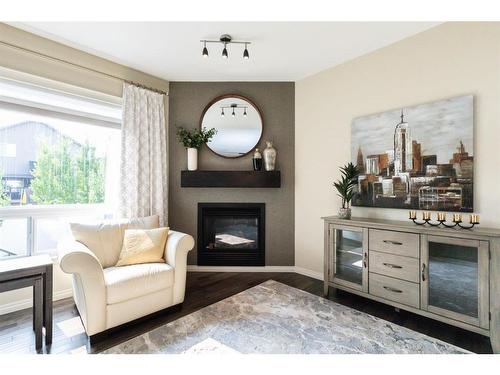 19 Voisin Close, Red Deer, AB - Indoor Photo Showing Living Room With Fireplace