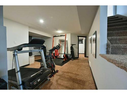 15 Pritchard Close, Sylvan Lake, AB - Indoor Photo Showing Gym Room