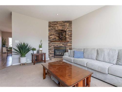 12 Valentine Crescent, Red Deer, AB - Indoor Photo Showing Living Room With Fireplace