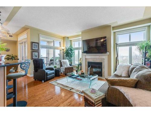601-9020 Jasper Avenue Nw, Edmonton, AB - Indoor Photo Showing Living Room With Fireplace