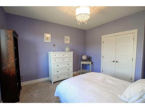 105-38254 Range Road 265, Rural Red Deer County, AB - Indoor Photo Showing Bedroom