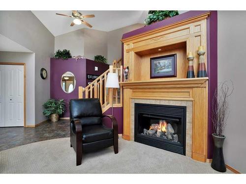 5404 52A, Eckville, AB - Indoor Photo Showing Living Room With Fireplace