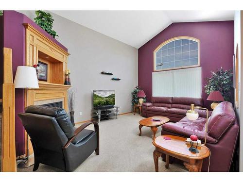 5404 52A, Eckville, AB - Indoor Photo Showing Living Room With Fireplace