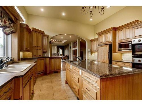 105-37411 Waskasoo Avenue, Rural Red Deer County, AB - Indoor Photo Showing Kitchen With Double Sink