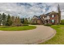 105-37411 Waskasoo Avenue, Rural Red Deer County, AB  - Outdoor With Facade 